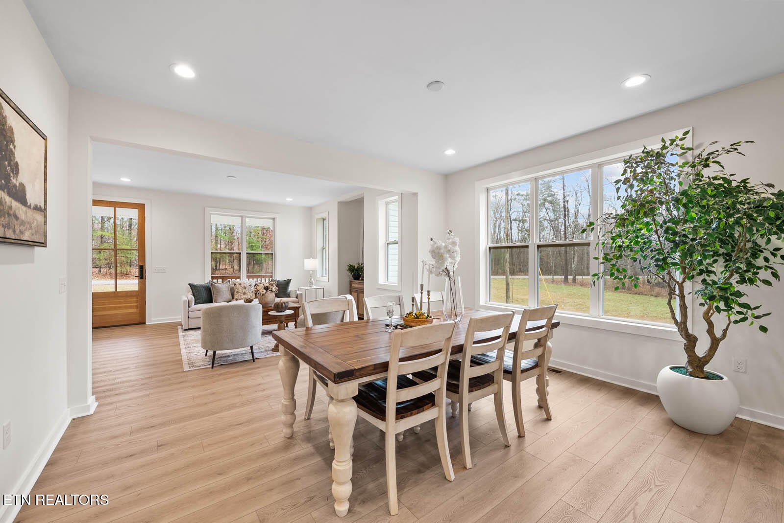 1023 West Laurel Way Monterey, TN 38574 - Photo 9 of 60 a view of a dining room with furniture and wooden floor