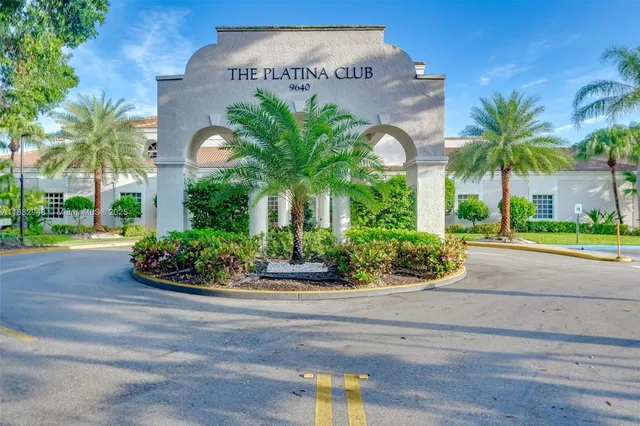 an aerial view of city and lake