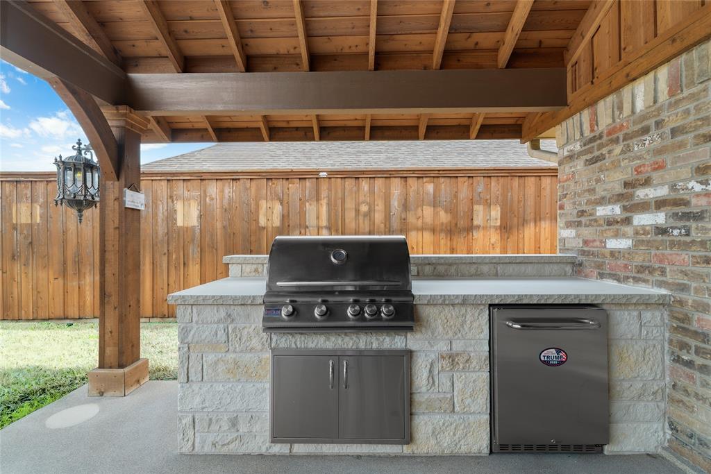 9727 Amberley Drive Dallas, TX 75243 - Photo 18 of 19 a stove top oven sitting inside of a kitchen