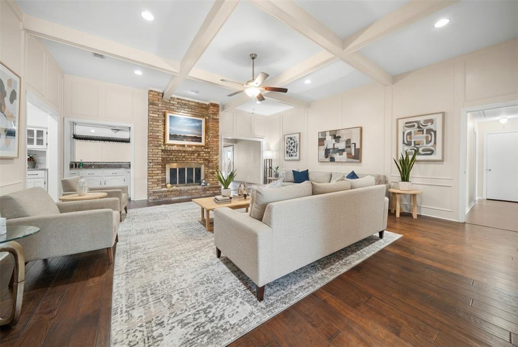 9727 Amberley Drive Dallas, TX 75243 - Photo 2 of 19 a living room with furniture and a large window