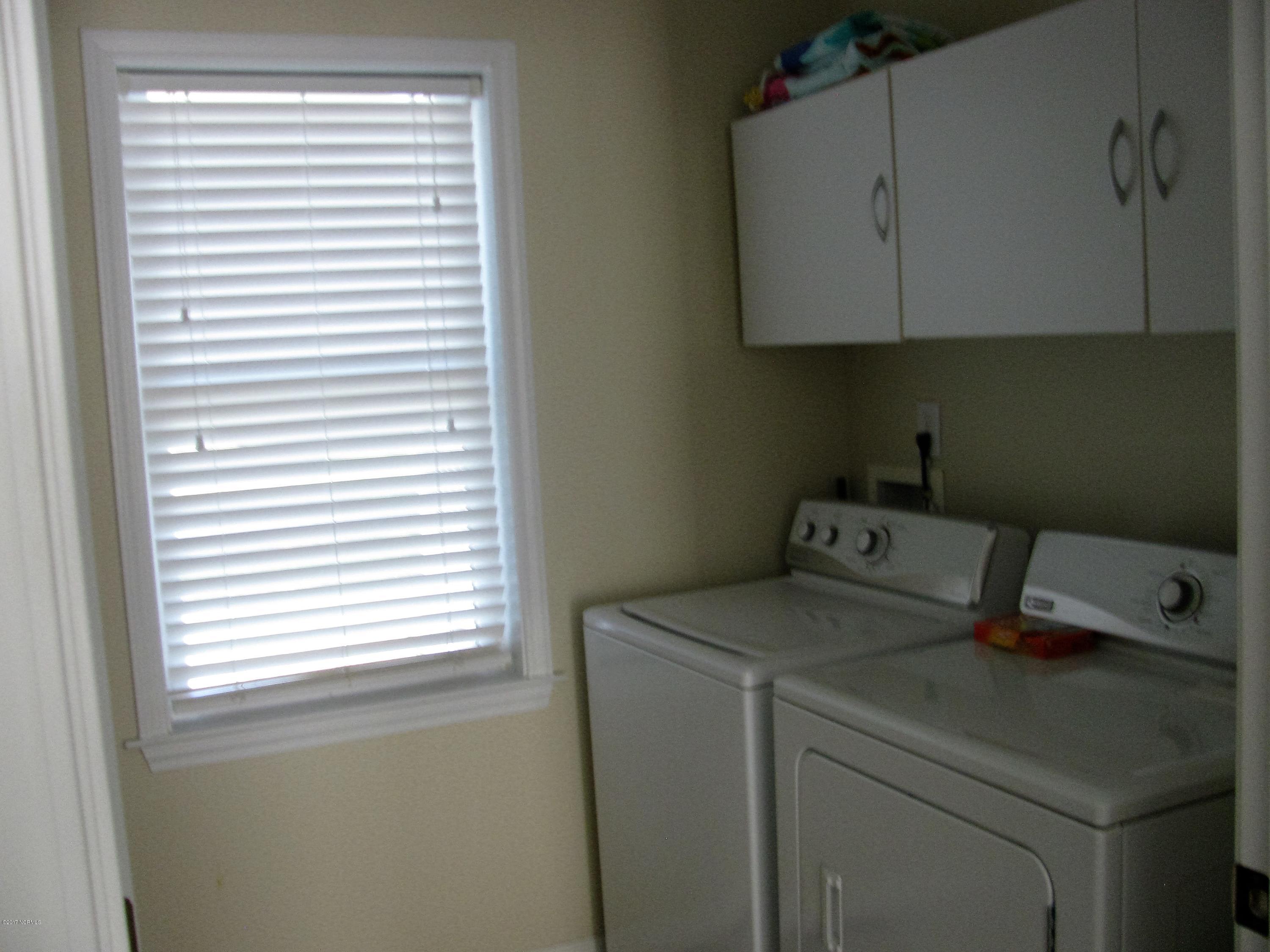 300 Riverside Drive Varnamtown, NC 28462 - Photo 9 of 16 Laundry-- Washer and Dryer convey with the home.