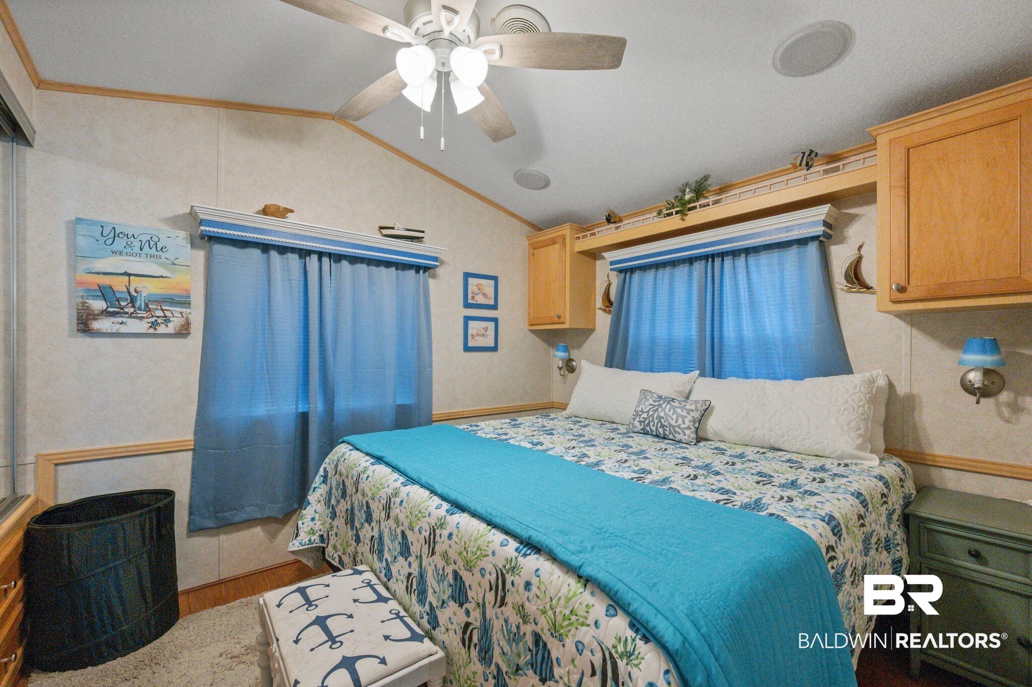 24711 County Road 20, Unit A11 Elberta, AL 36530 - Photo 13 of 35 Bedroom with vaulted ceiling, ceiling fan, wood finished floors, and ornamental molding