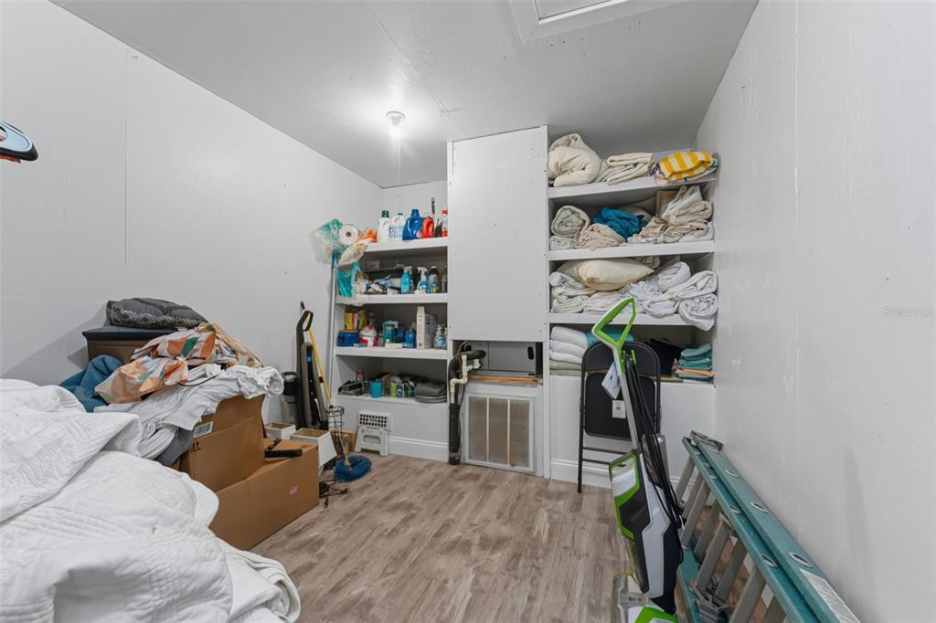 208 Bates Avenue Indian Rocks Beach, FL 33785 - Photo 28 of 47 a view of a workspace with furniture and toys