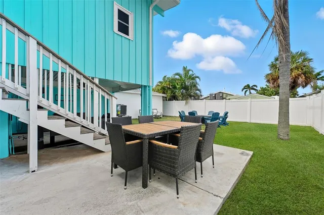 a view of balcony with furniture