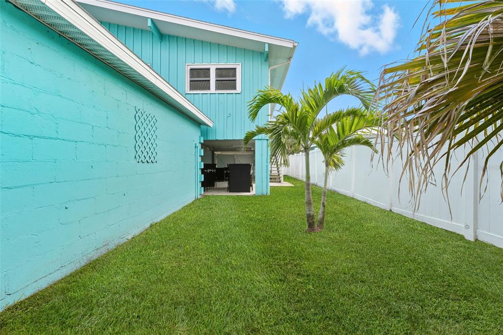208 Bates Avenue Indian Rocks Beach, FL 33785 - Photo 34 of 47 a house view with a garden space