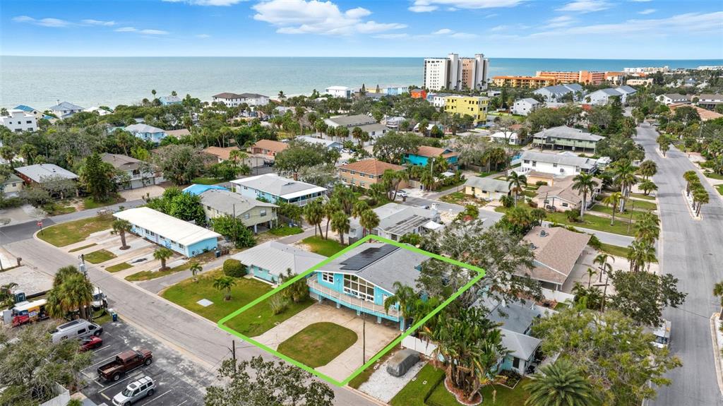 208 Bates Avenue Indian Rocks Beach, FL 33785 - Photo 45 of 47 an aerial view of residential houses with outdoor space