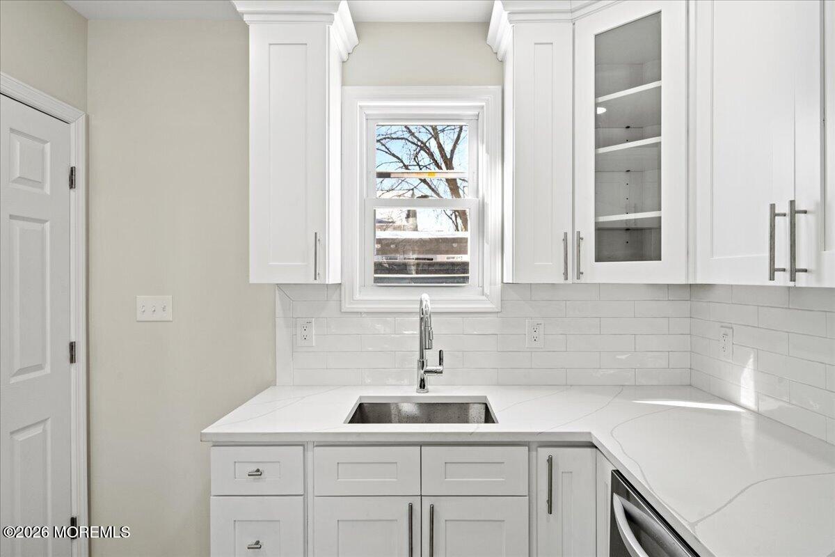 20 Elston Street Bloomfield, NJ 07003 - Photo 13 of 43 a kitchen with a sink and cabinets