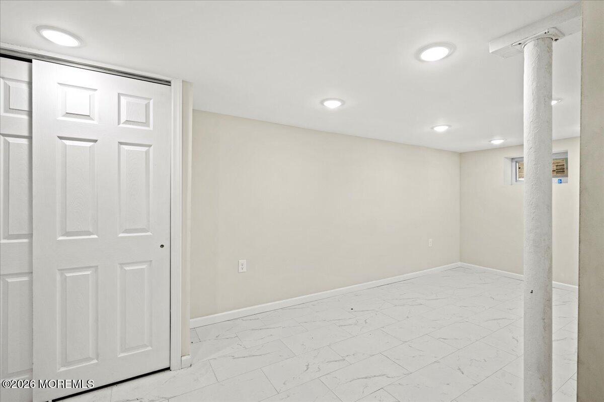 20 Elston Street Bloomfield, NJ 07003 - Photo 40 of 43 an empty room with windows and closet