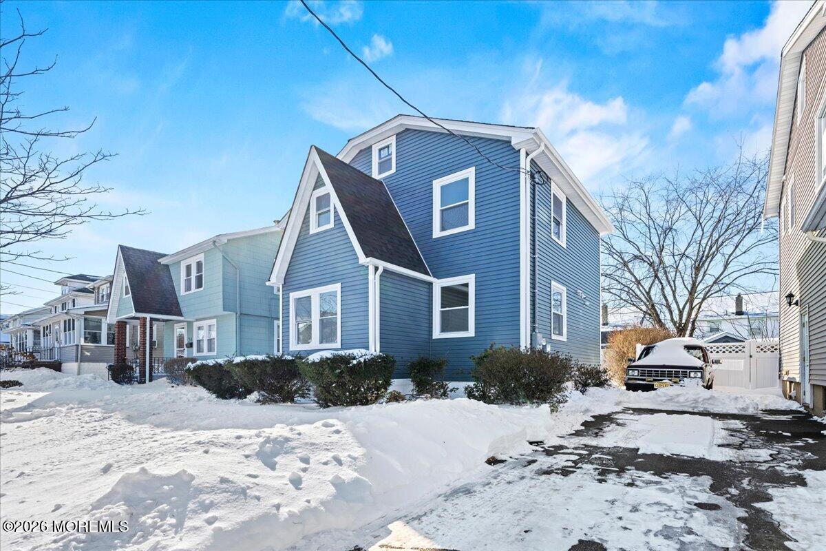 20 Elston Street Bloomfield, NJ 07003 - Photo 4 of 43 a front view of a house with a yard