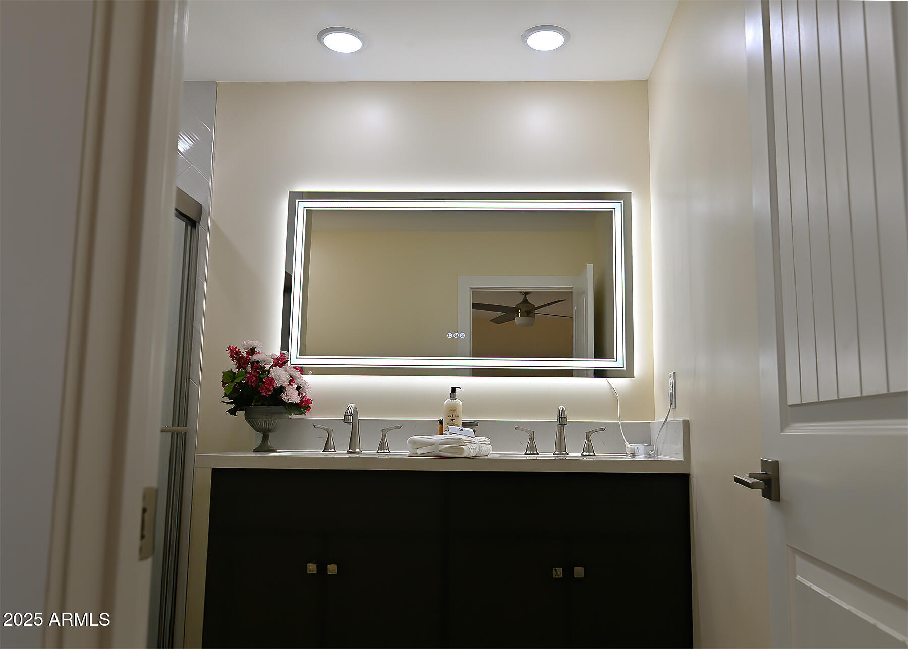 20214 East Mesa Verde Road Mayer, AZ 86333 - Photo 9 of 26 a bathroom with a sink and a mirror