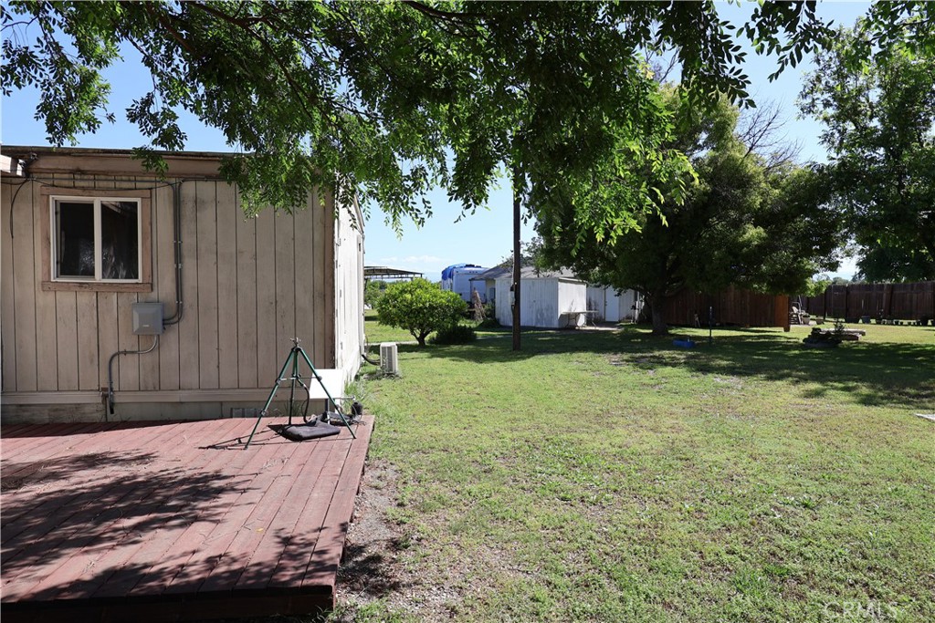 22189 Samson Avenue Corning, CA 96021 - Photo 34 of 59 a backyard of a house with lots of green space