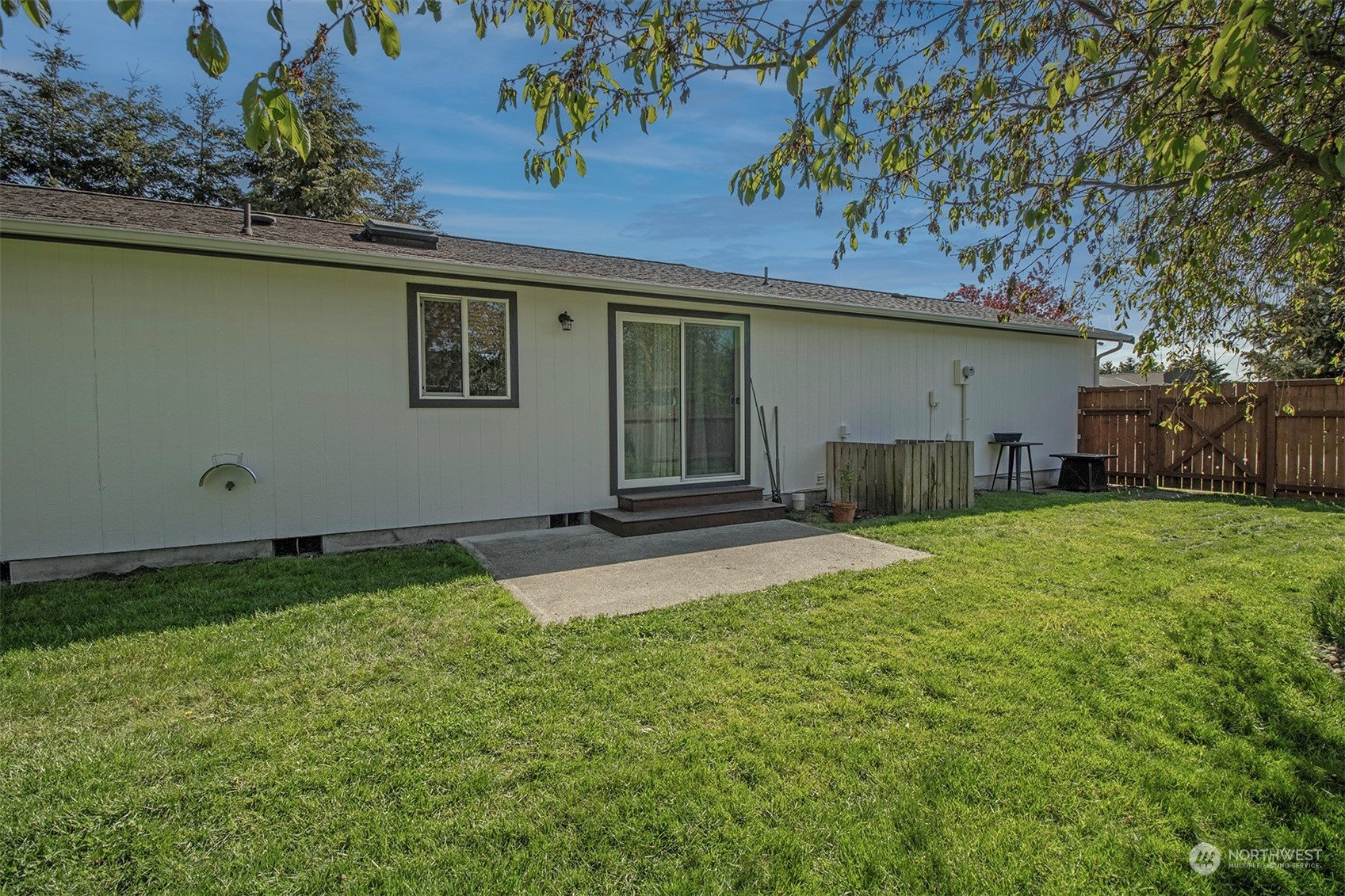 17836 Camus Drive Southwest Rochester, WA 98579 - Photo 25 of 27 a house view with a garden space