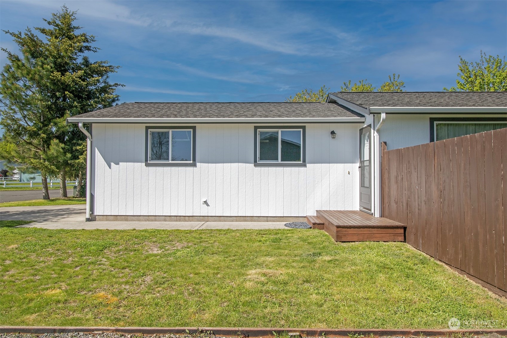 17836 Camus Drive Southwest Rochester, WA 98579 - Photo 3 of 27 a front view of a house with garden