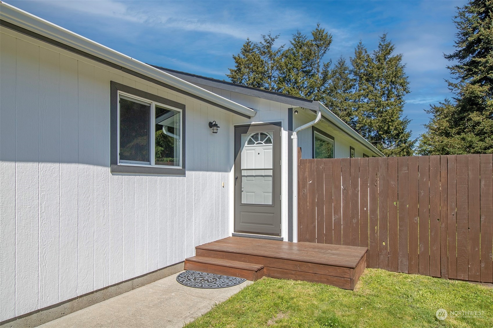 17836 Camus Drive Southwest Rochester, WA 98579 - Photo 4 of 27 a front view of a house with a yard