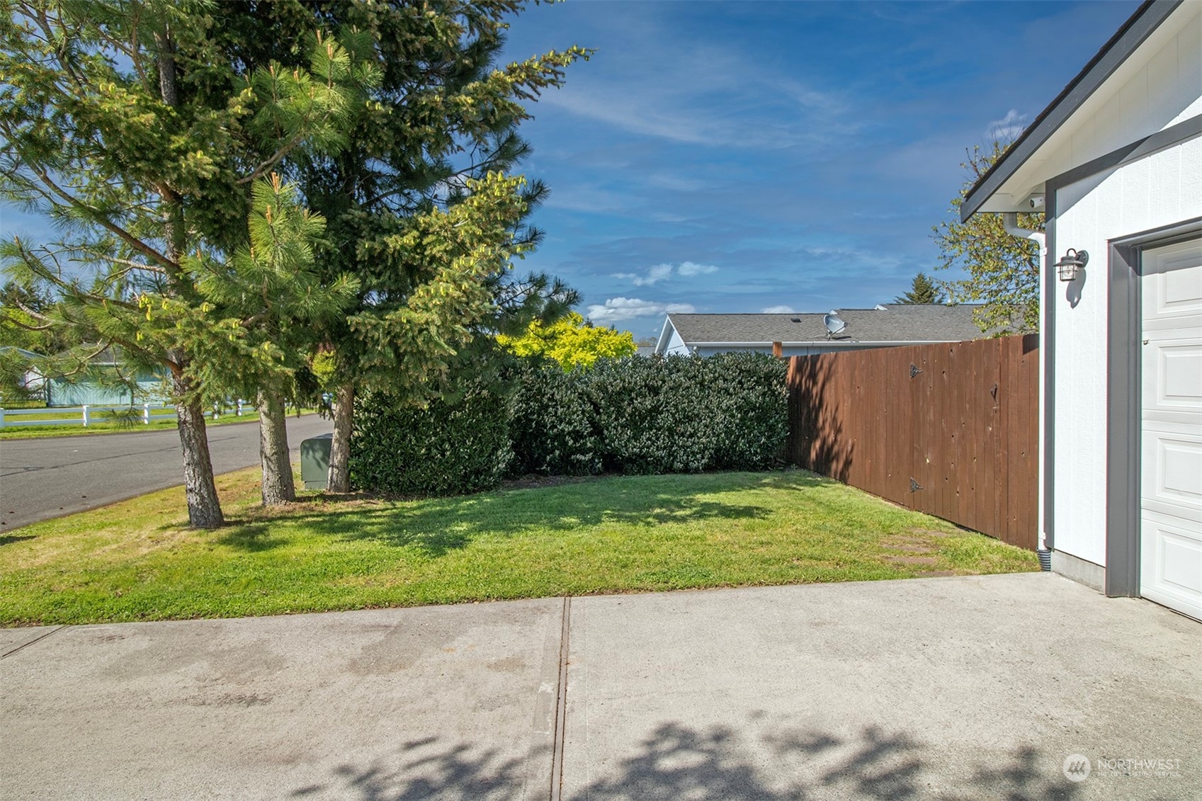 17836 Camus Drive Southwest Rochester, WA 98579 - Photo 5 of 27 a view of a backyard with a garden