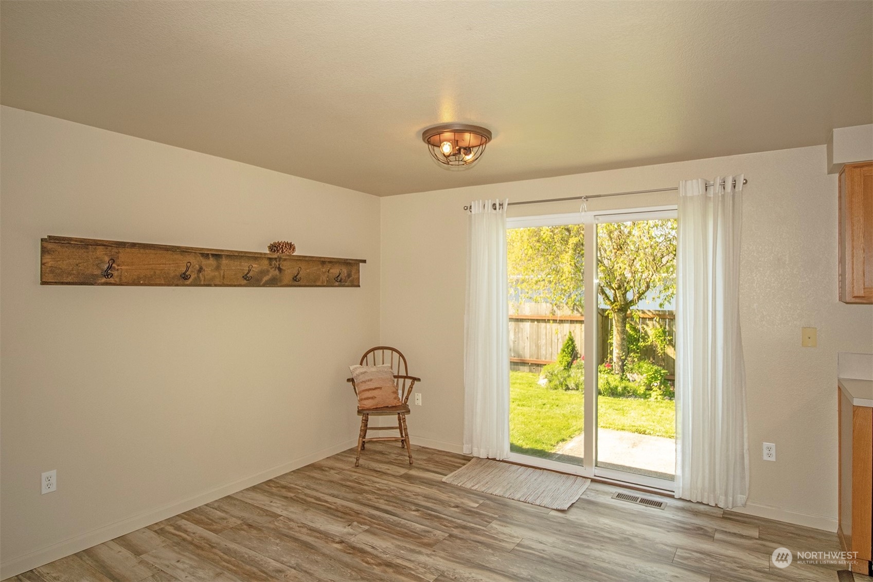 17836 Camus Drive Southwest Rochester, WA 98579 - Photo 8 of 27 a view of a room with racks on the wall and a window