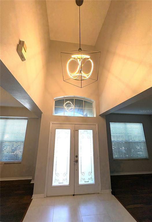 1431 Spring Fest Lane Orlando, FL 32828 - Photo 5 of 36 a view of entryway and window