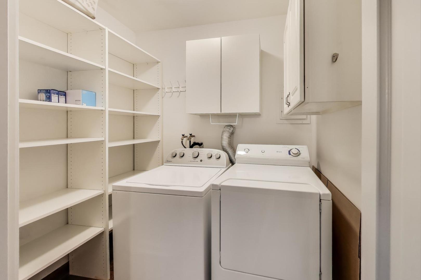 636 West Grace Street, Unit 2W Chicago, IL 60613 - Photo 21 of 26 a utility room with dryer and washer