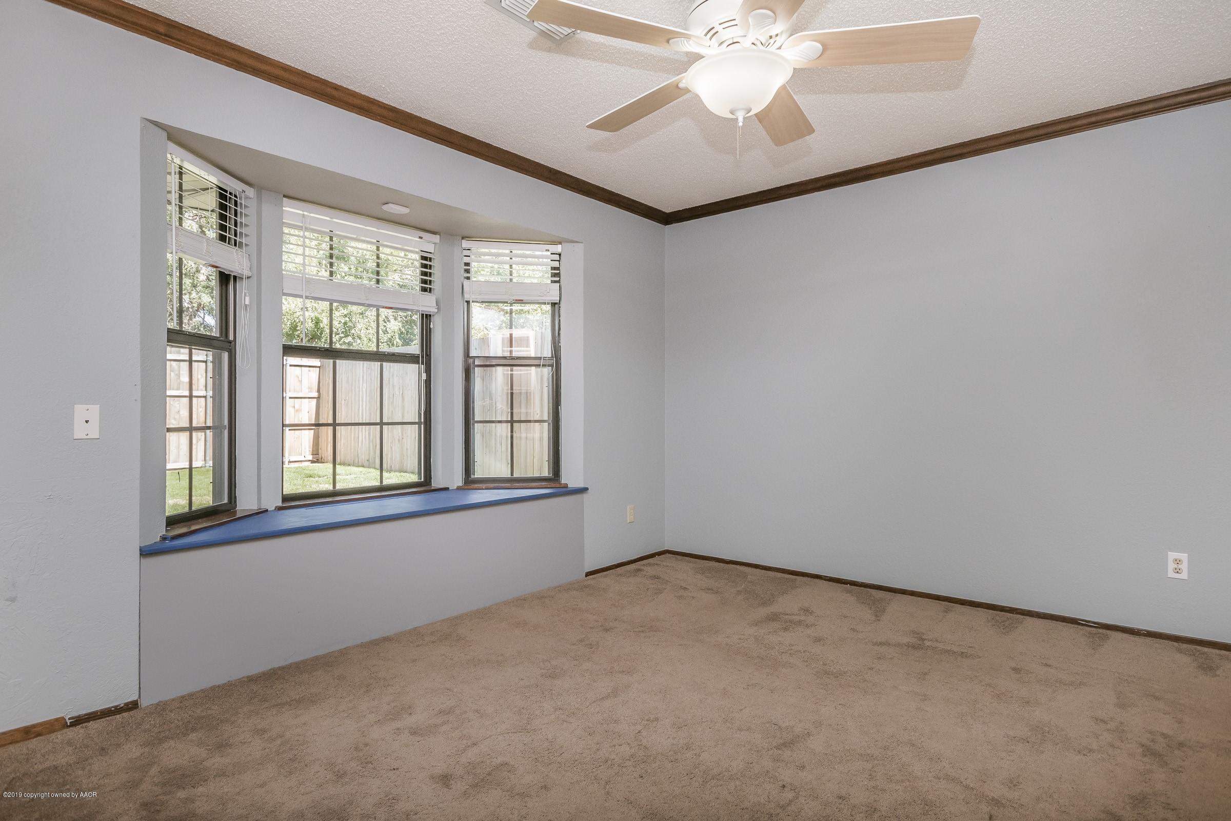 5610 Southwest 41st Avenue Amarillo, TX 79109 - Photo 23 of 30 an empty room with a window