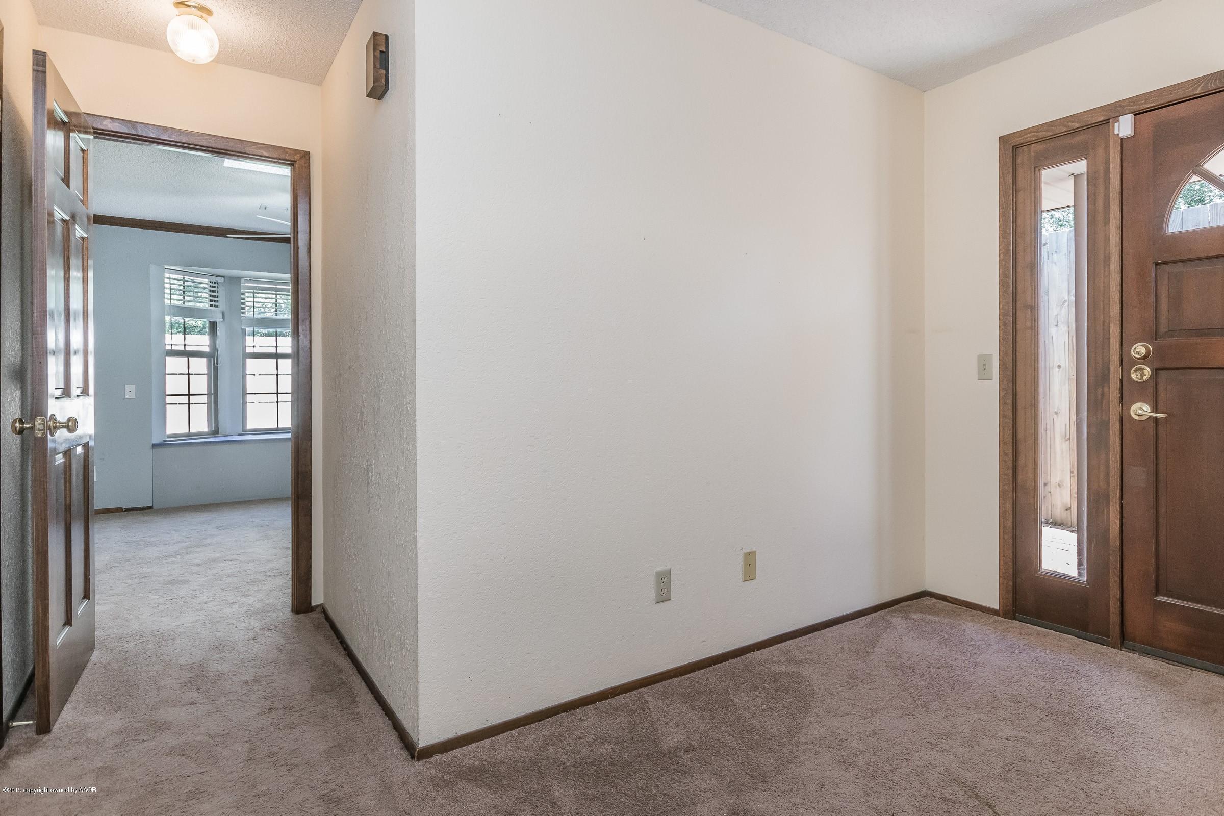 5610 Southwest 41st Avenue Amarillo, TX 79109 - Photo 24 of 30 an empty room with windows and a view