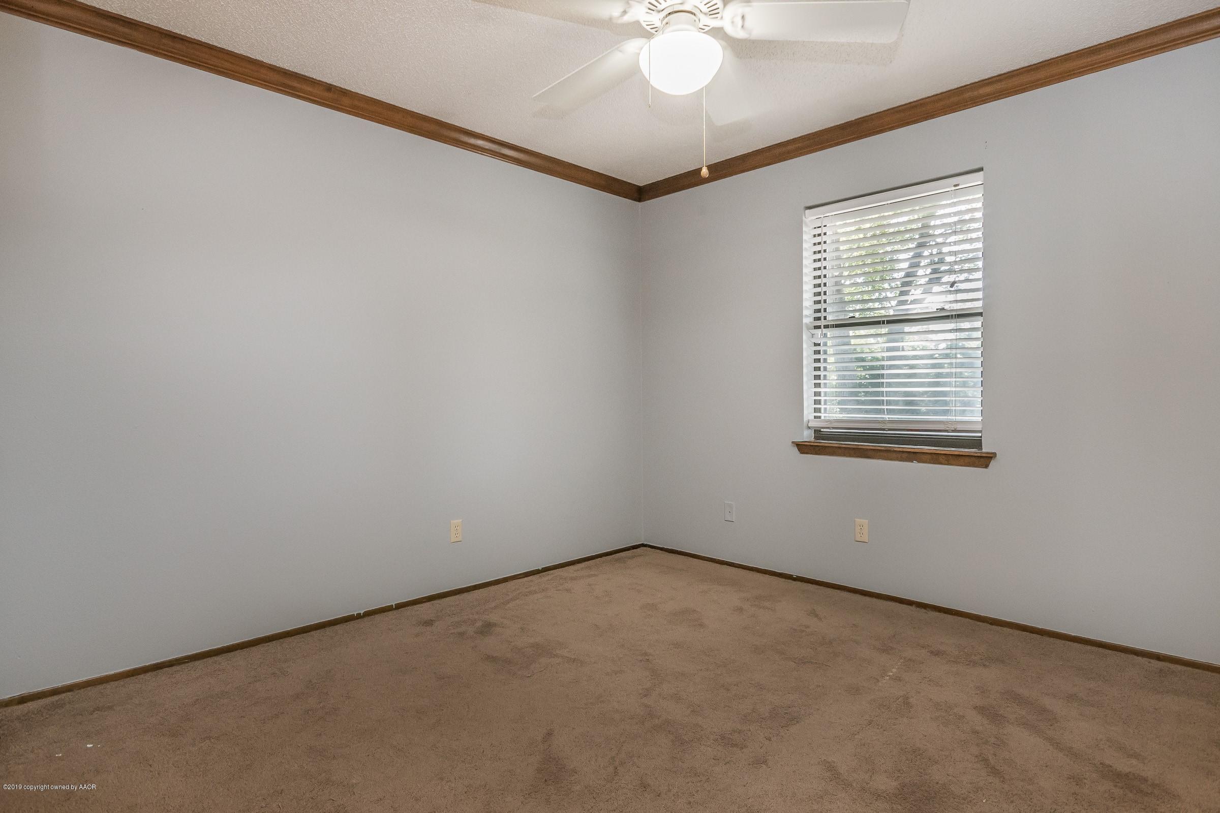 5610 Southwest 41st Avenue Amarillo, TX 79109 - Photo 25 of 30 an empty room with a window