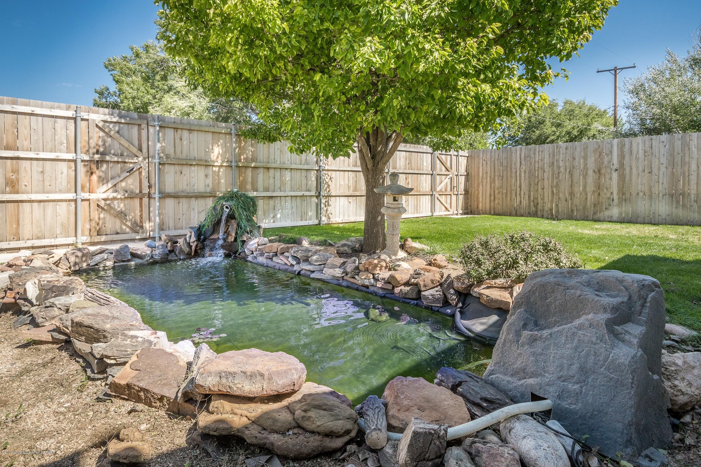 5610 Southwest 41st Avenue Amarillo, TX 79109 - Photo 27 of 30 a backyard of a house with yard and outdoor seating