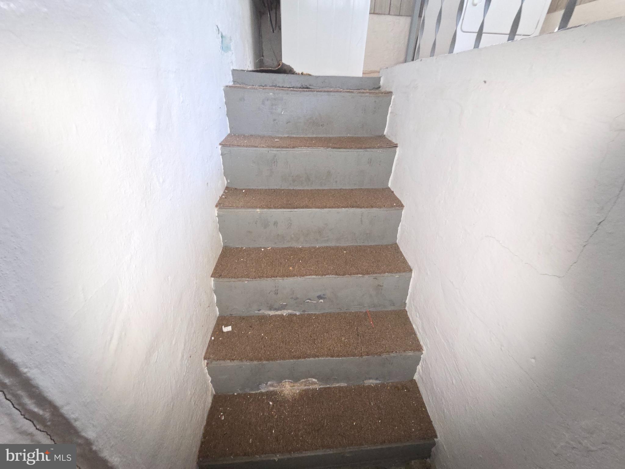 1814 Division Road Pasadena, MD 21122 - Photo 24 of 32 Stairs from Basement to Side Porch