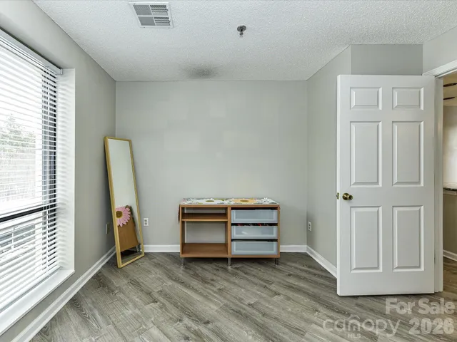 a view of room with stairs and a window