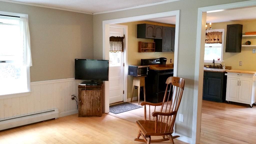 164 Kennebunk Road Alfred, ME 04002 - Photo 7 of 27 Spacious living room offers lots of...
