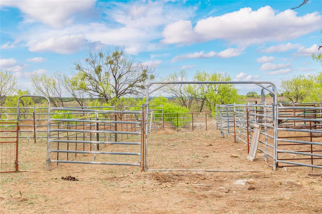 377 Mercury Tx 76872 Rochelle, TX 76872 - Photo 21 of 32 a view of a yard with wooden fence
