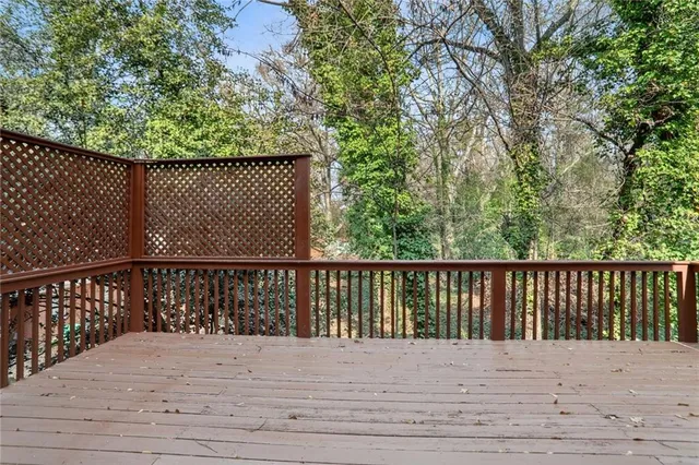 a view of balcony with wooden floor