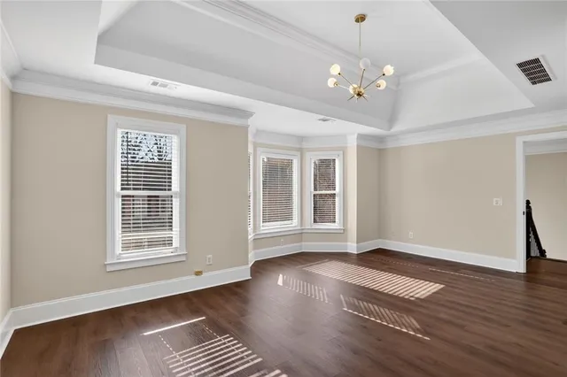 a view of livingroom with window hardwood floor and ceiling fan
