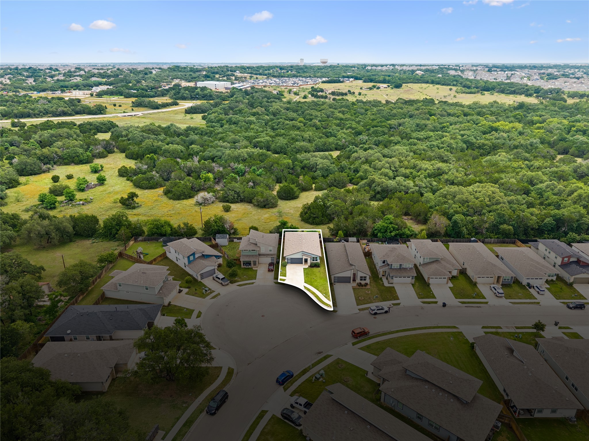 249 Century Plant Road Leander, TX 78641 - Photo 21 of 22 a view of a city with lawn chairs