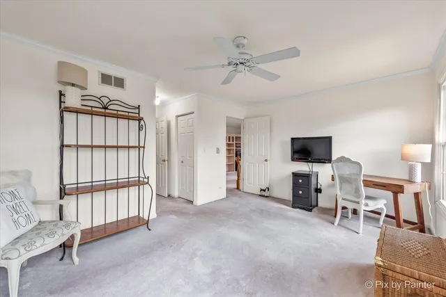 a view of a livingroom with furniture and a flat screen tv