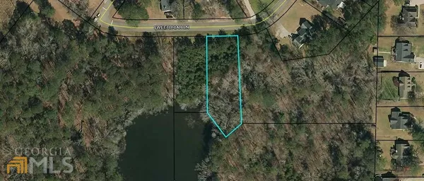 a view of backyard with green space