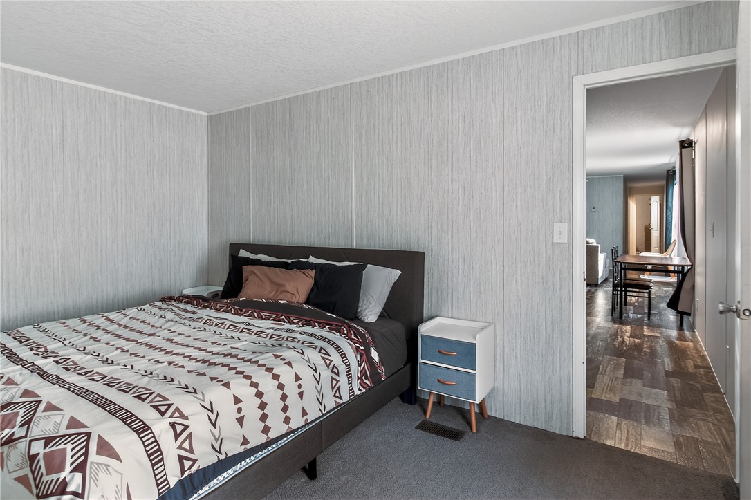 862 North Old Mill Road Easley, SC 29640 - Photo 8 of 24 This cozy bedroom offers a tranquil retreat with soft textures and a bright ambiance.