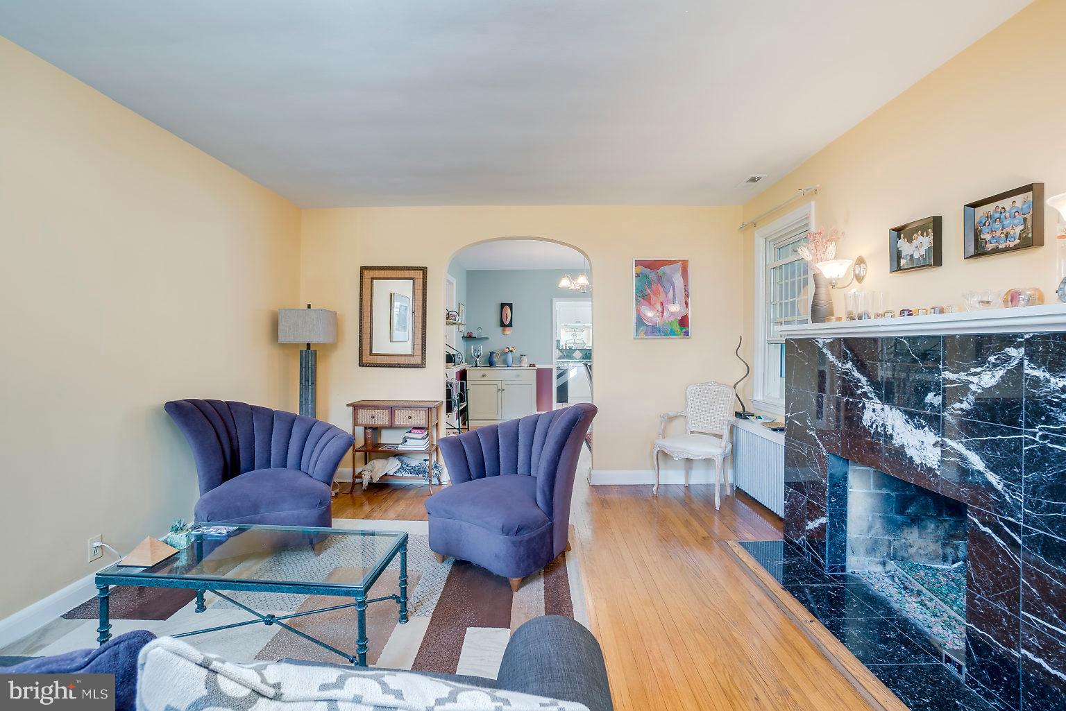 4319 Barrington Road Baltimore, MD 21229 - Photo 5 of 49 living room with gas fireplace