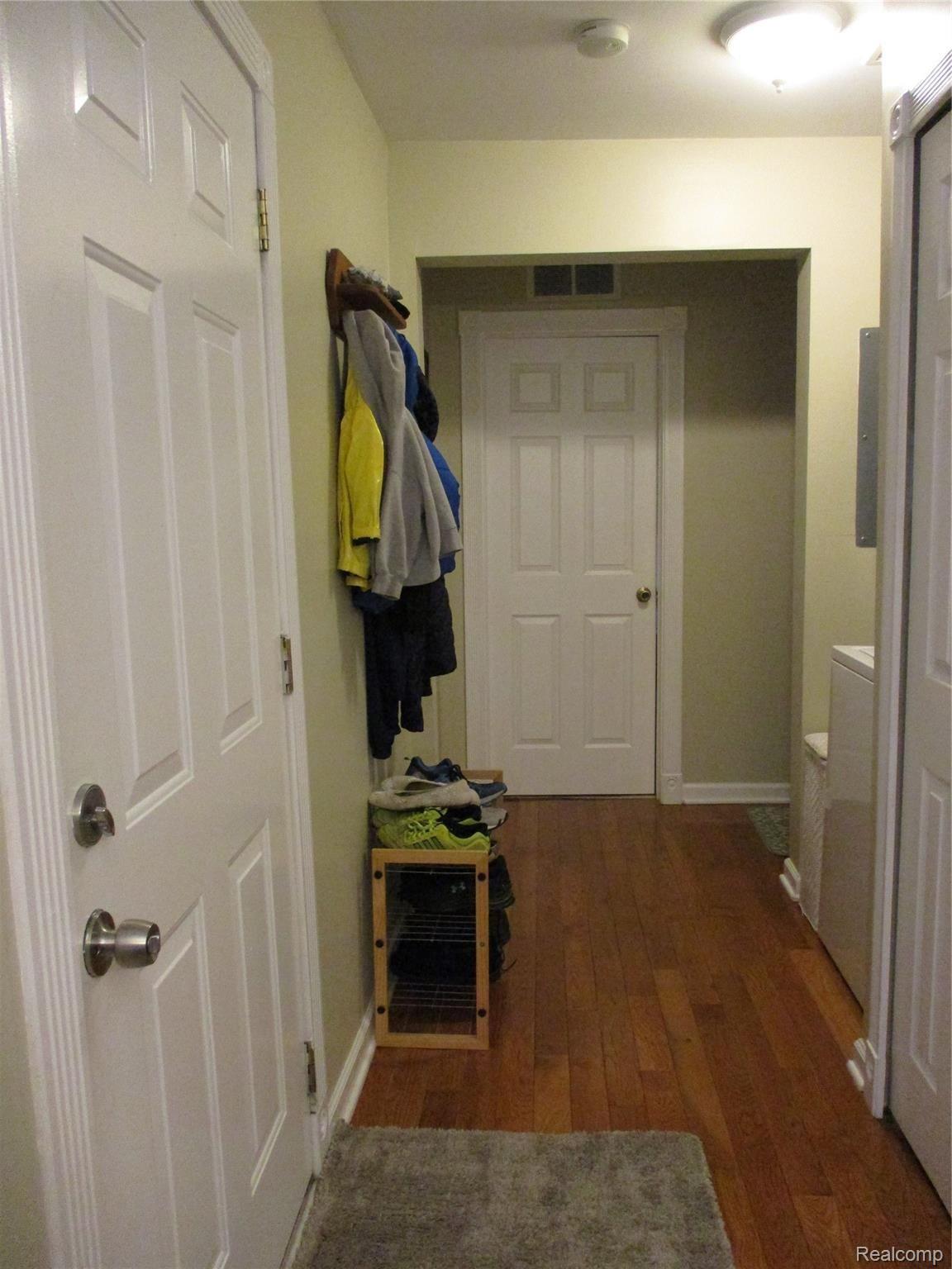 19215 Inkster Road Livonia, MI 48152 - Photo 38 of 43 MUD ROOM WITH HARDWOOD FLOORS