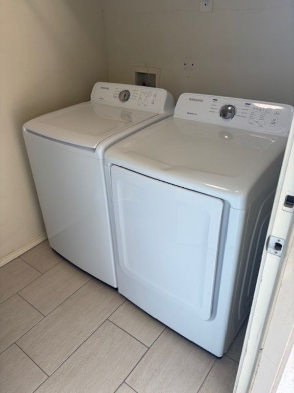 307 Quarry Street San Marcos, TX 78666 - Photo 31 of 38 Laundry area featuring washing machine and clothes dryer