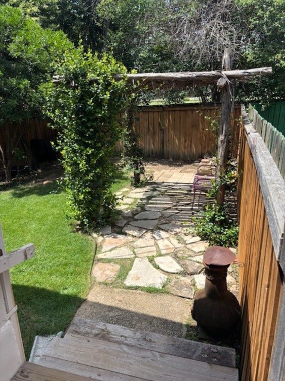 307 Quarry Street San Marcos, TX 78666 - Photo 33 of 38 Fenced backyard with a deck