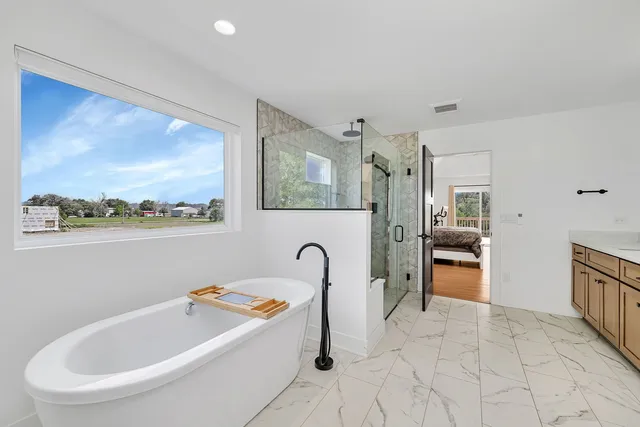 a view of balcony with wooden floor and fence