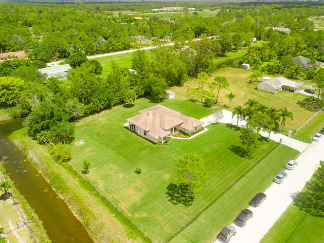 14713 86th Road North The Acreage, FL 33470 - Photo 18 of 51 14713 86th Rd N-small-018-13-Aerial-666x
