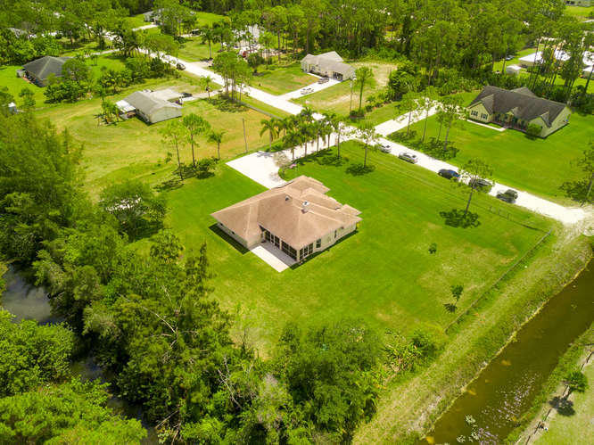 14713 86th Road North The Acreage, FL 33470 - Photo 20 of 51 14713 86th Rd N-small-020-12-Aerial-666x