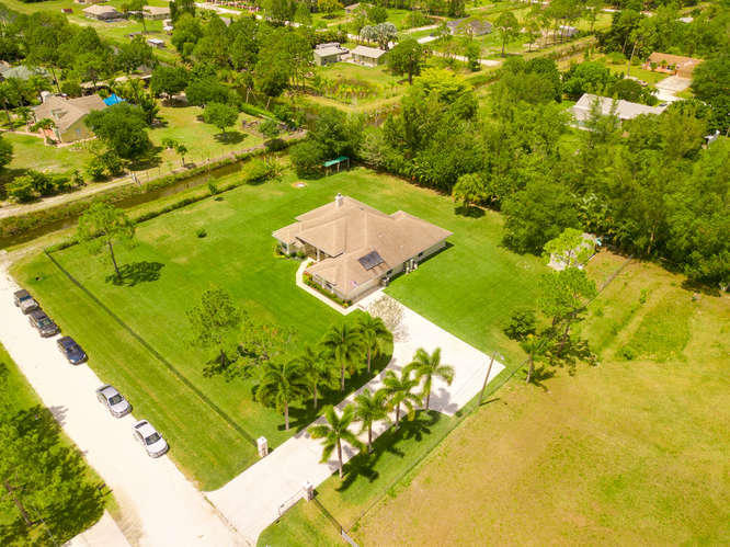 14713 86th Road North The Acreage, FL 33470 - Photo 21 of 51 14713 86th Rd N-small-021-14-Aerial-666x