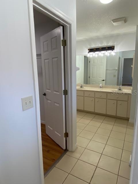8427 Southwest 136th Street Ocala, FL 34473 - Photo 12 of 18 a bathroom with a tub and a sink