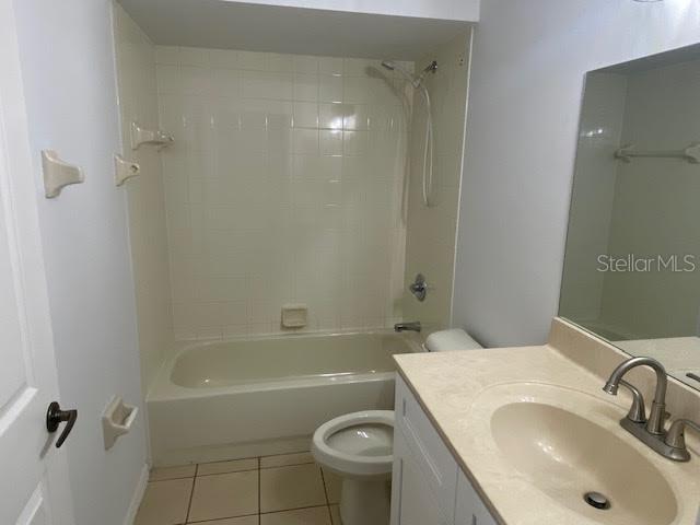 8427 Southwest 136th Street Ocala, FL 34473 - Photo 15 of 18 a bathroom with a sink a toilet and shower