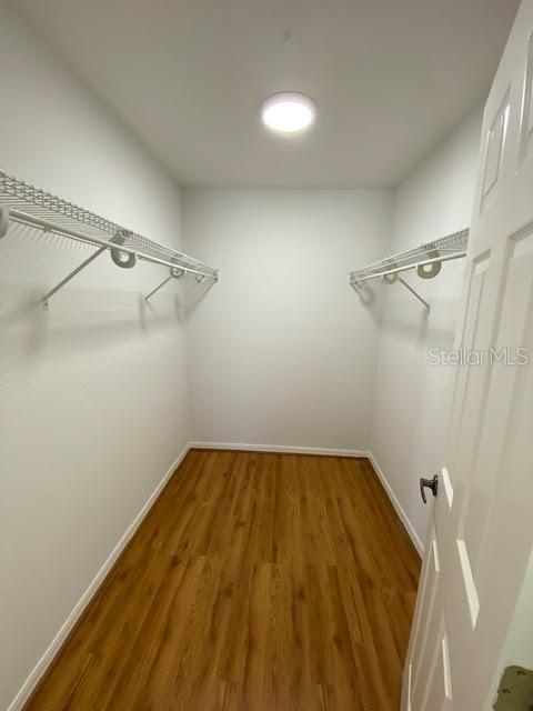 8427 Southwest 136th Street Ocala, FL 34473 - Photo 8 of 18 a view of a room with wooden floor