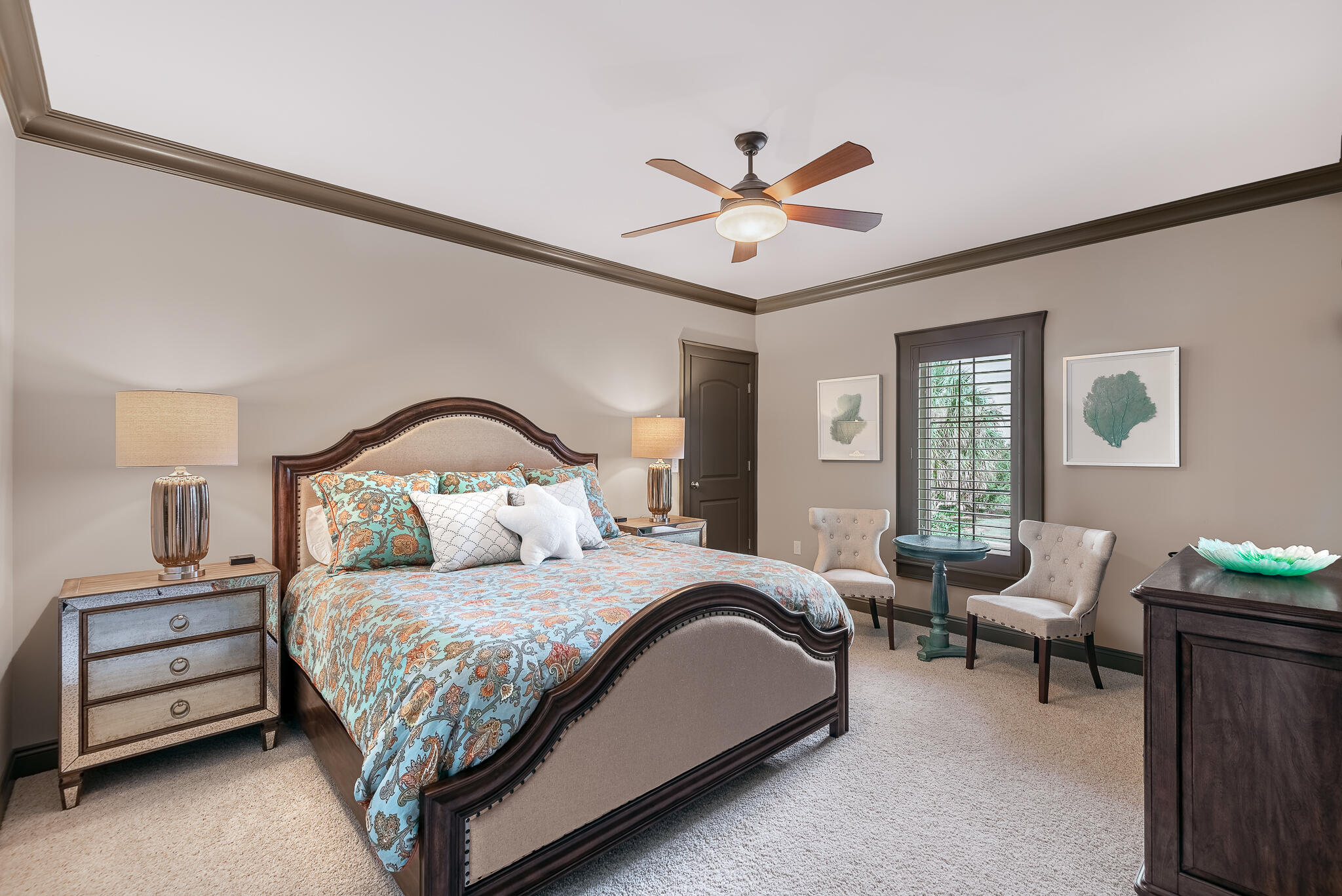 1758 Driftwood Point Road Santa Rosa Beach, FL 32459 - Photo 54 of 71 a bedroom with a bed and a chandelier