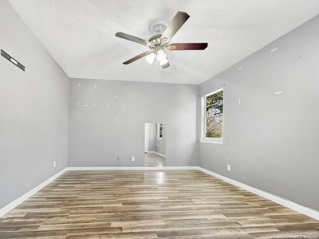 a view of a house with a yard and garage