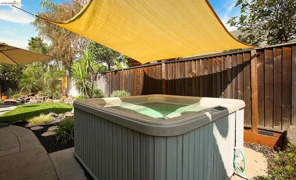 a view of swimming pool with a backyard